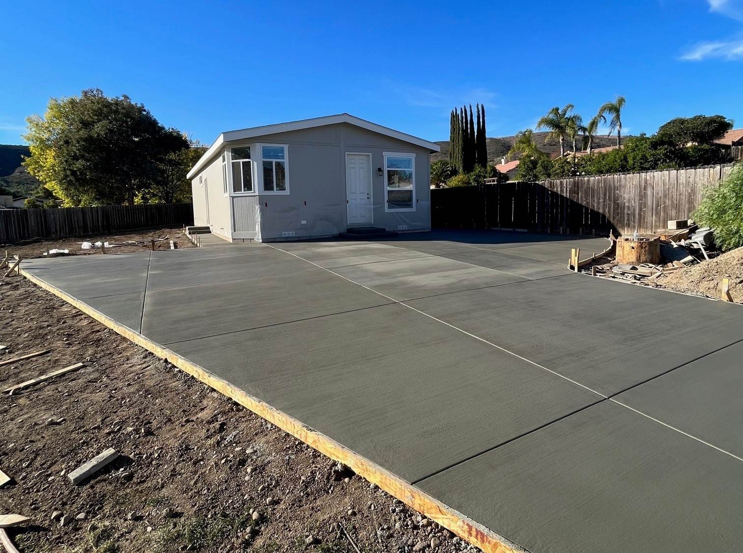 a cement driveway H