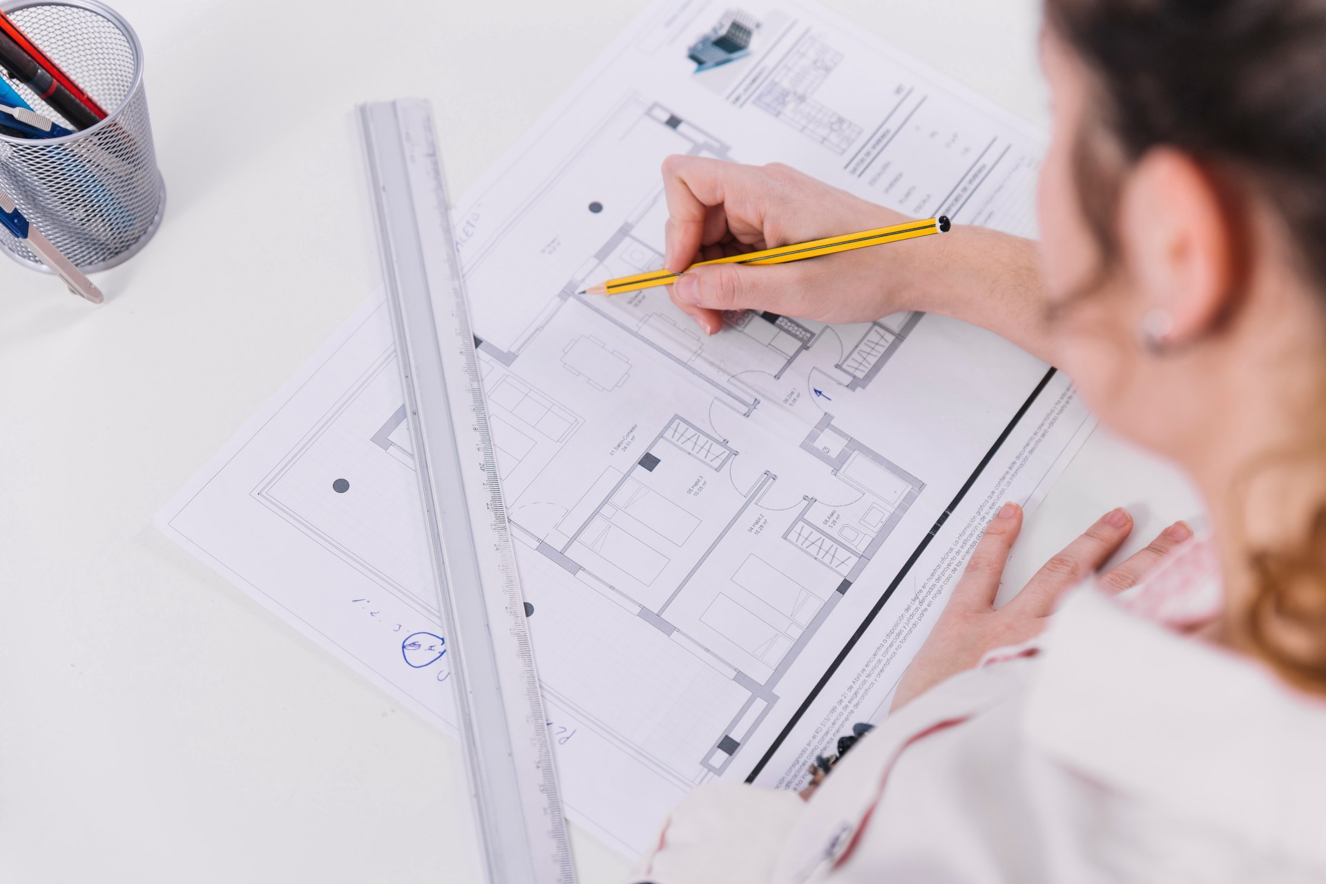from woman drawing blueprint img from woman drawing blueprint img